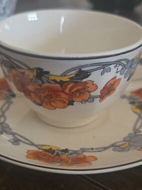 Homer Laughlin Cream Teacup and Saucer with Orange Floral Band